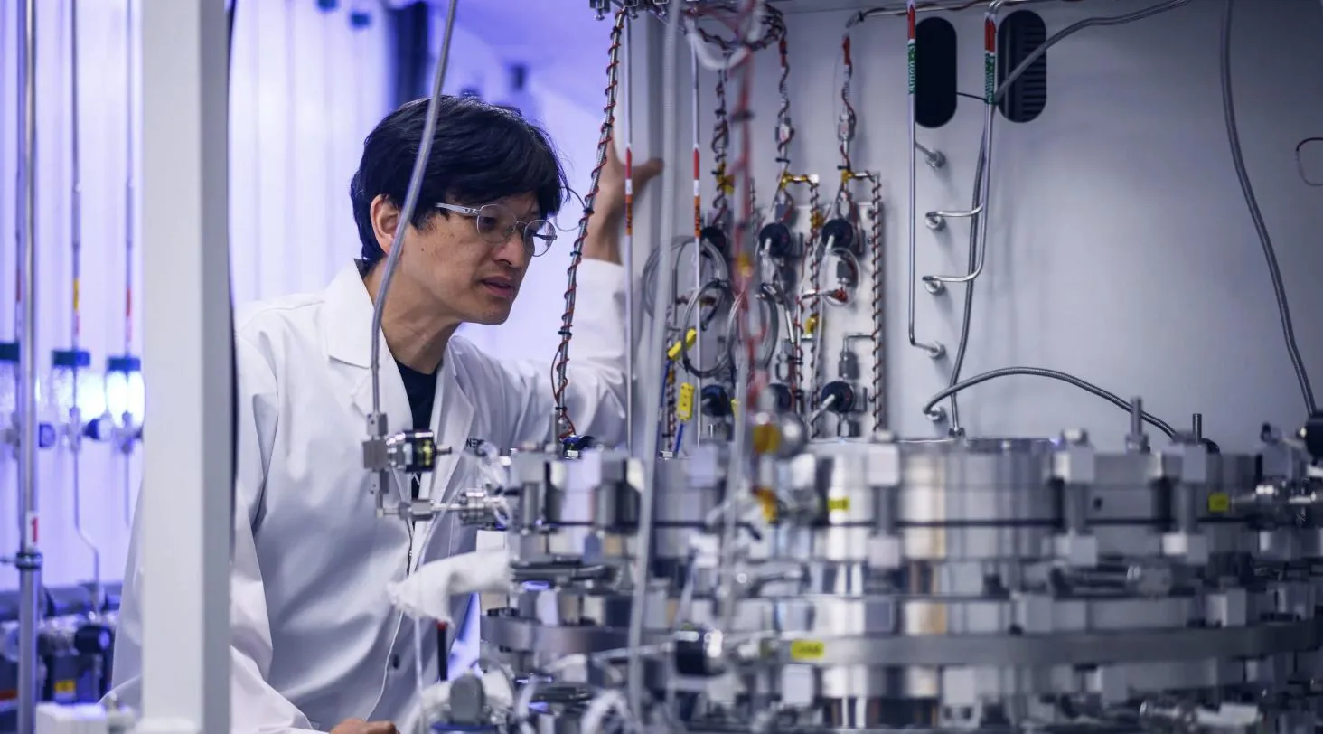 Dr. Lance Li inspecting the growth chamber of Nexstrom’s CVD platform
